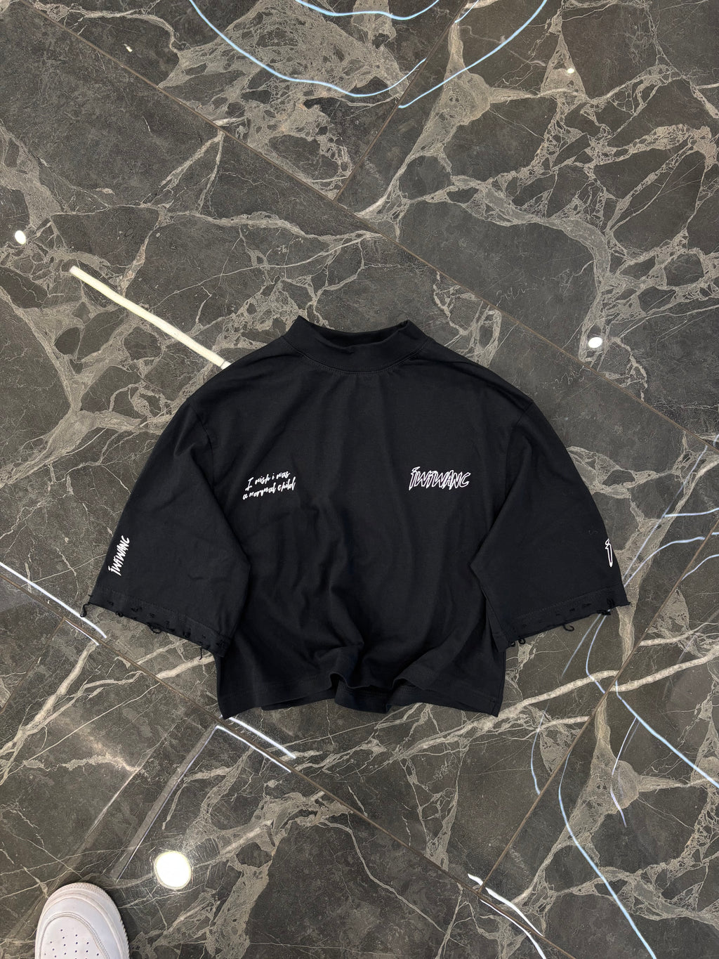 Influential character distressed crop top