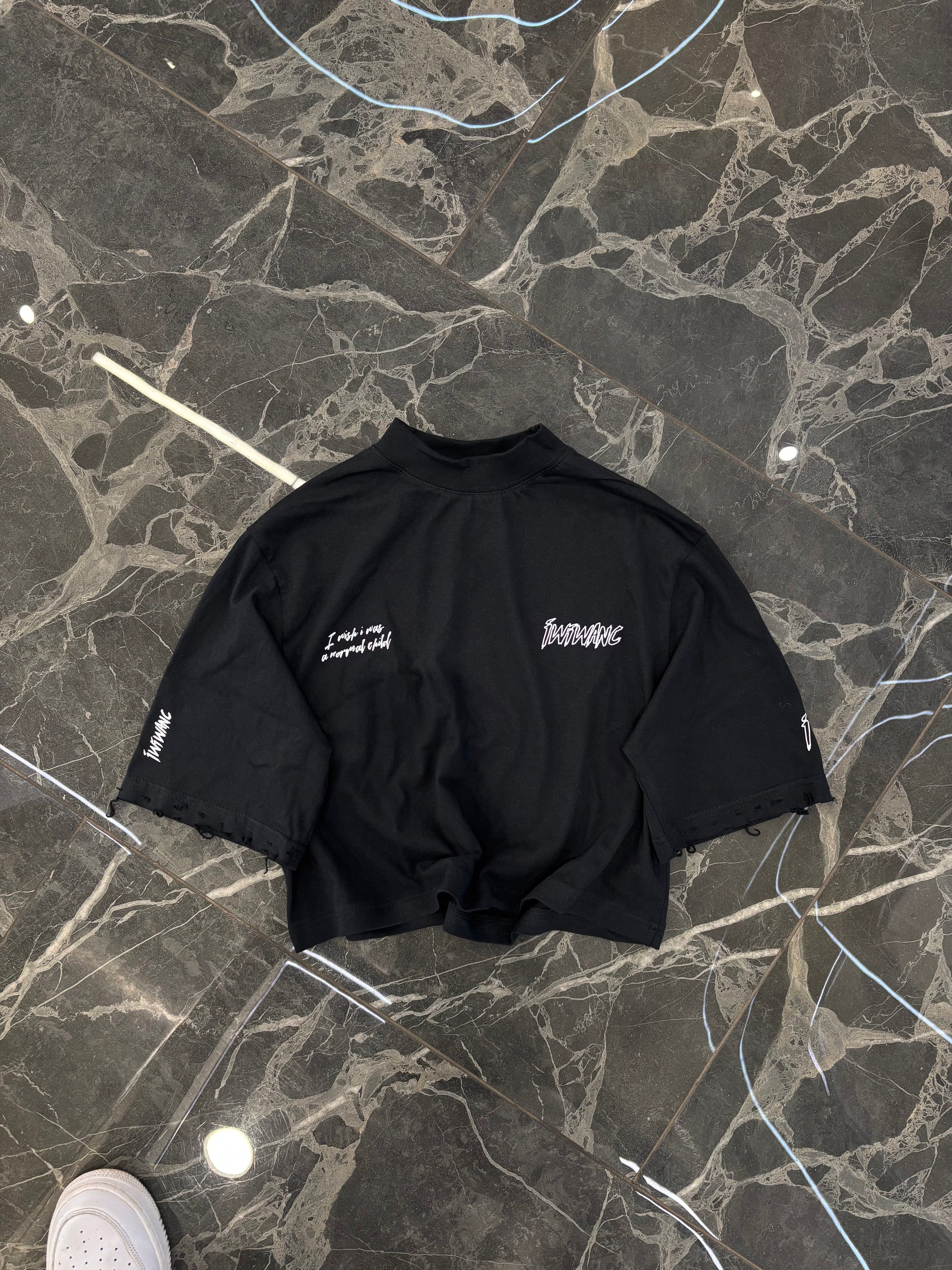 Influential character distressed crop top