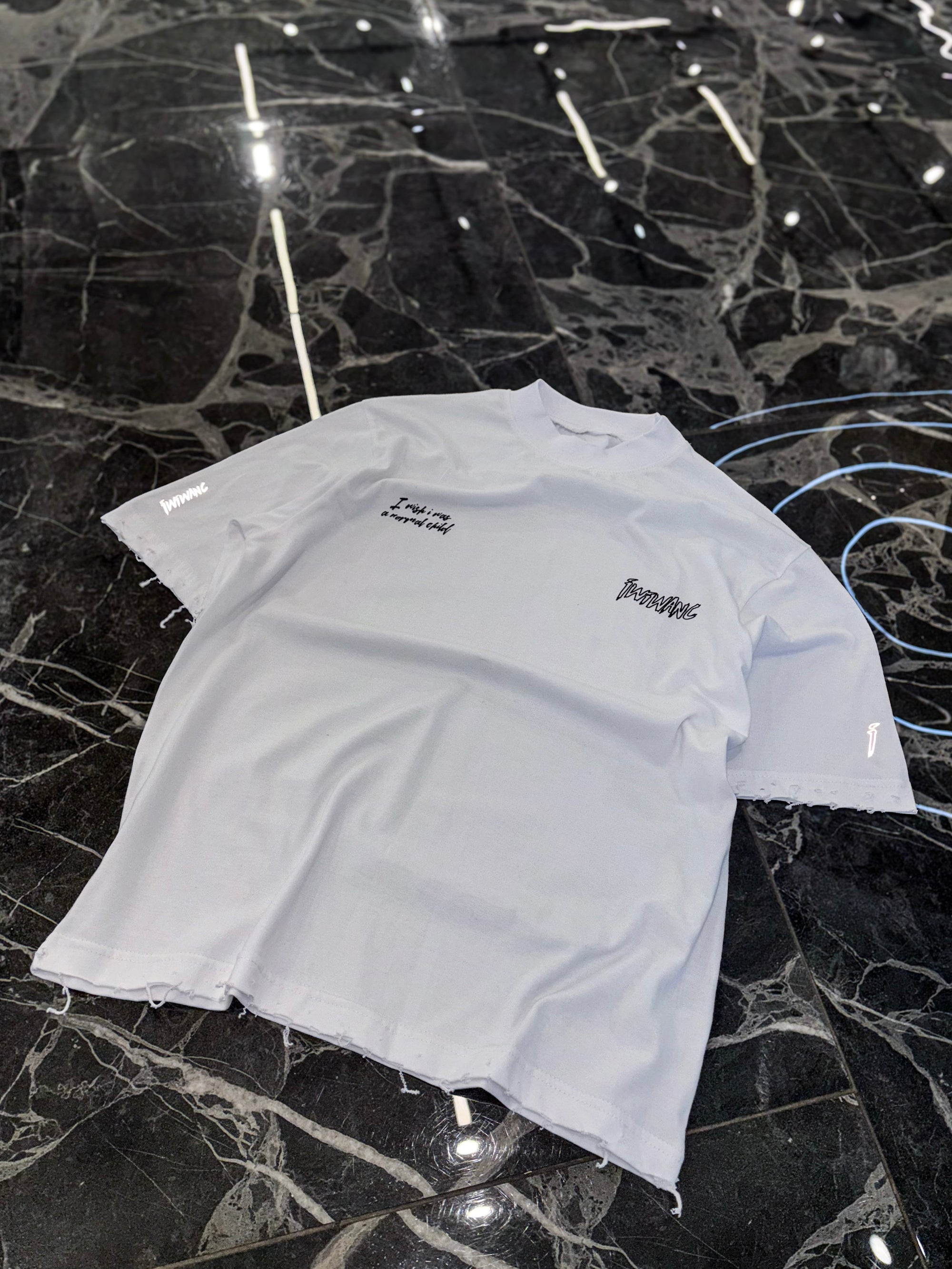 Influential character distressed tee